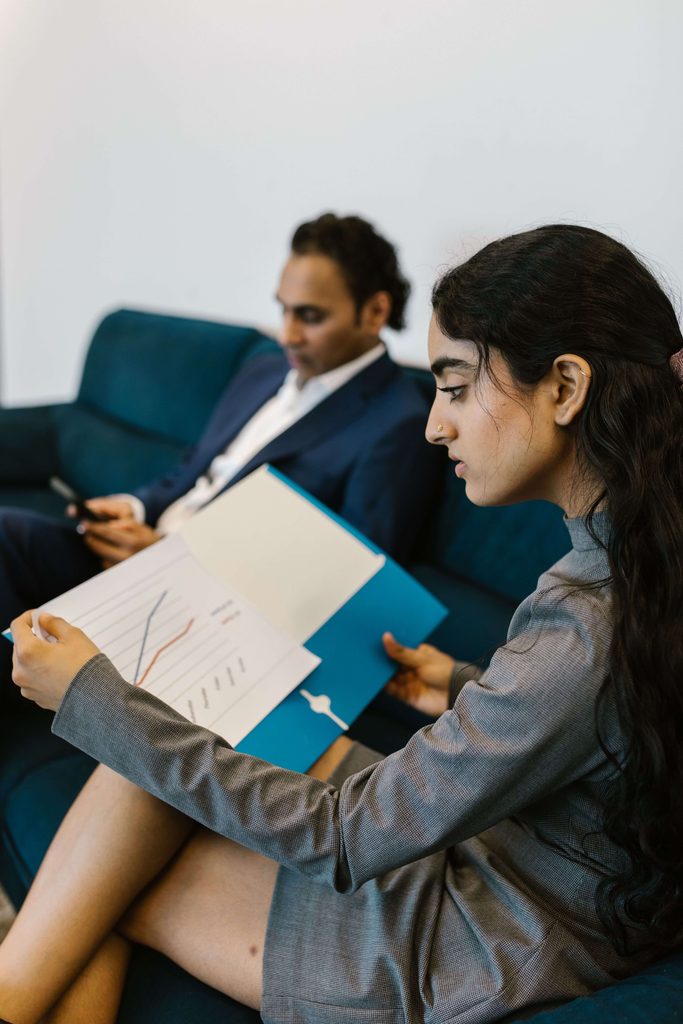 HR professional reviewing payroll and compliance reports